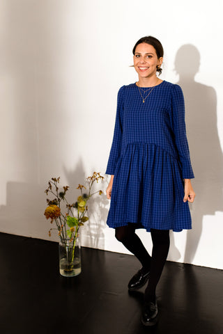 NORA blue check
