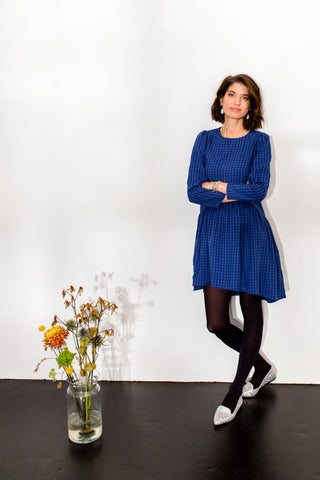 NORA blue check